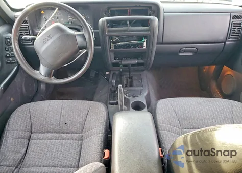 1999 Jeep Cherokee Sport z USA, uszkodzony, nr VIN 1J4FF68S7XL573353